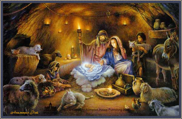 Grote animatie van een kerststal - Jozef en Maria met het kindeke Jezus in de kribbe in de stal met schapen, lammeren en een ezel