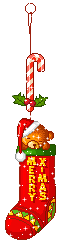 Mini animatie van een kerstcadeau - Merry X-mas op een rode kerstsok waar een beertje uitkomt die een kerstmuts draagt