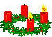 Mini kerstmis animatie van een kerstkaars - Kerstkrans met vier rode kaarsen waarvan er twee branden