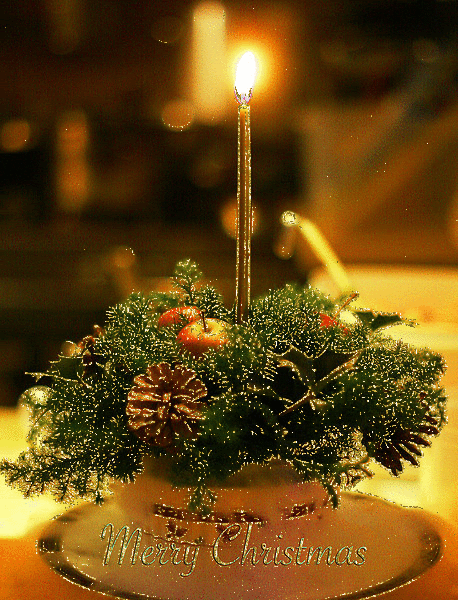 Grote kerstanimatie van een kerstkaars - Merry Christmas met een kerststukje met kerstgroen en een brandende kaars
