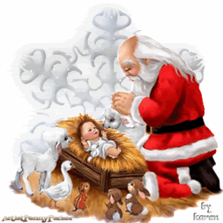 Grote animatie van een kerststal - Kerstman samen met de dieren bij het kindeke Jezus in de kribbe