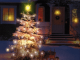 Mini kerstanimatie van een kerstboom - Besneeuwde kerstboom met gekleurde kerstverlichting