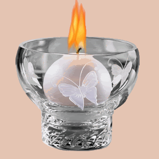 Grote kerstanimatie van een kerstkaars - Brandende witte kaars in een glas