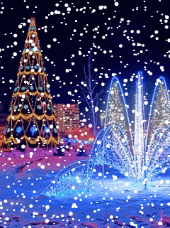 Middelgrote animatie van sneeuw - Kerstboom in de sneeuw met neerdwarrelende sneeuwvlokken