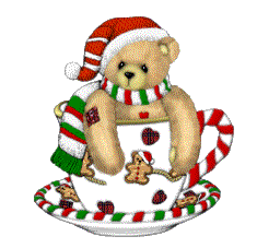Middelgrote animatie van een kerstdier - Beertje met een kerstmuts in een kopje